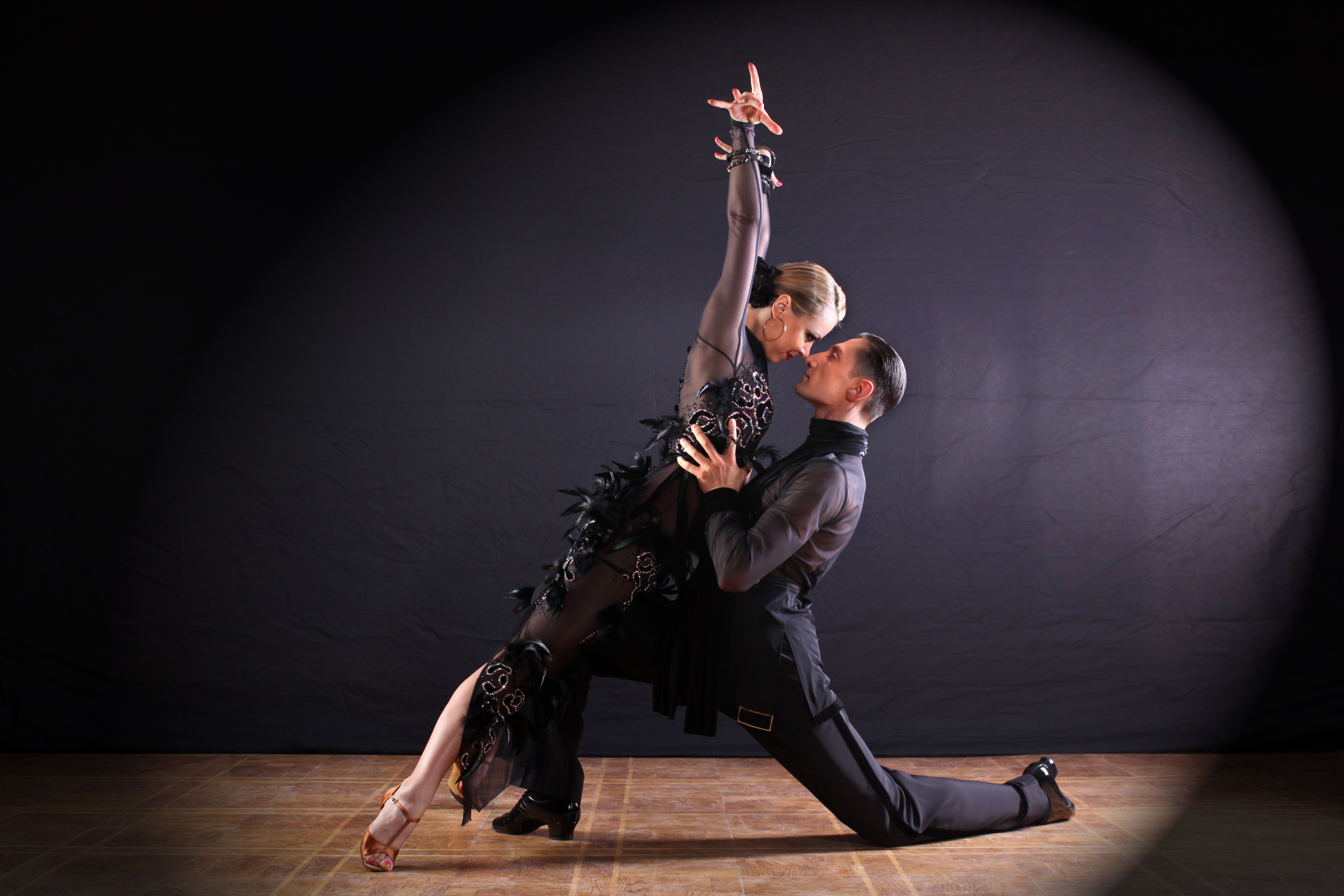 dancers in ballroom isolated on black background
